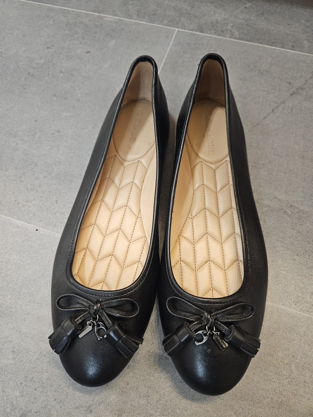Coach Black Leather Ballet Flats with Tassel Detail